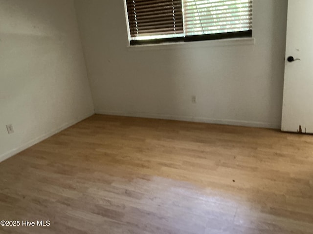 102 Tanglewood Dr, Jacksonville, NC 28540 - spare room featuring wood finished floors