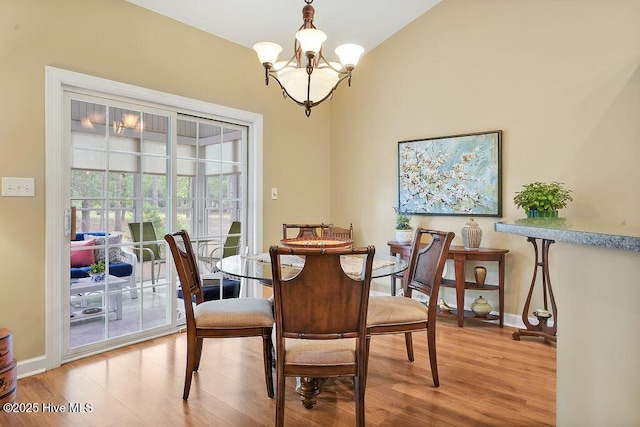 3853 Winding Vine Way, Southport, NC 28461 - dining room featuring a chandelier and light wood-type flooring