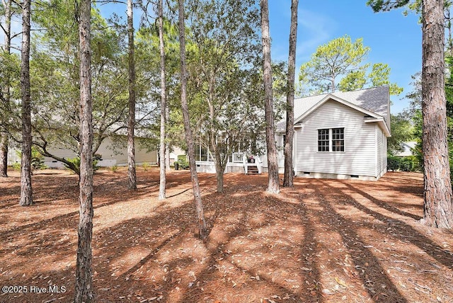 3853 Winding Vine Way, Southport, NC 28461 - rear view of property with crawl space and roof with shingles
