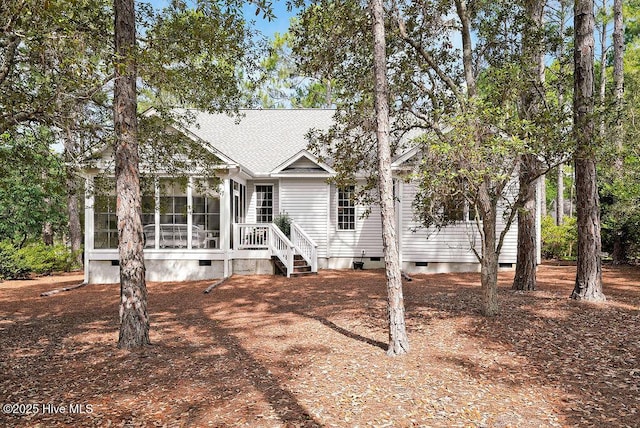 3853 Winding Vine Way, Southport, NC 28461 - view of front of house with crawl space and a sunroom