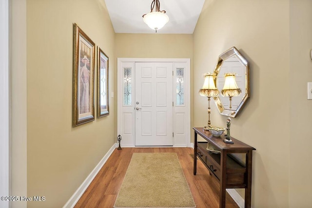 3853 Winding Vine Way, Southport, NC 28461 - entryway featuring wood finished floors and baseboards