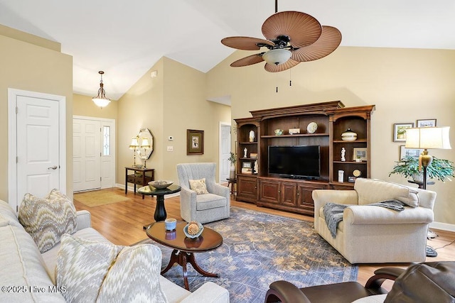 3853 Winding Vine Way, Southport, NC 28461 - living area with ceiling fan, light wood-type flooring, and high vaulted ceiling