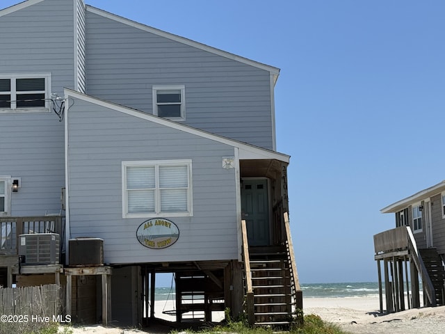 2310 New River Inlet Rd Unit 1, North Topsail Beach, NC 28460 - view of front of property featuring view of water and beach and stairway