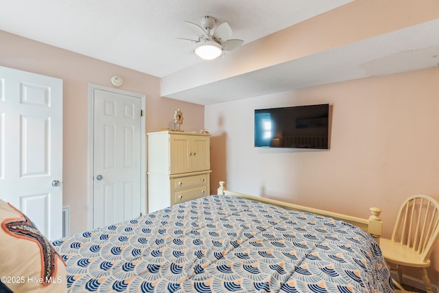 2310 New River Inlet Rd Unit 1, North Topsail Beach, NC 28460 - bedroom featuring baseboards and ceiling fan