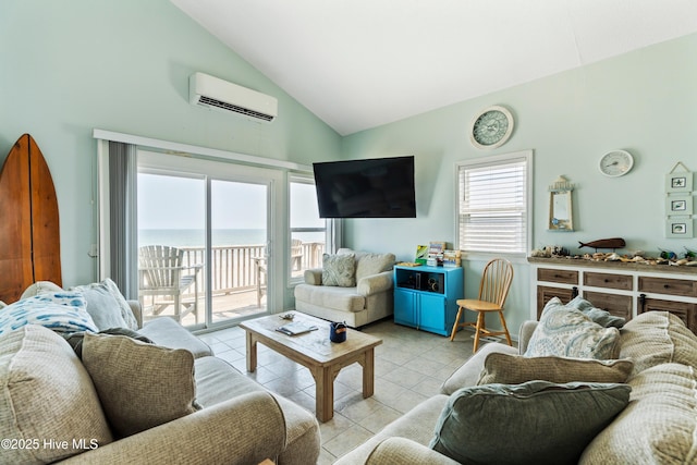 2310 New River Inlet Rd Unit 1, North Topsail Beach, NC 28460 - living area with an AC wall unit, light tile patterned floors, and high vaulted ceiling