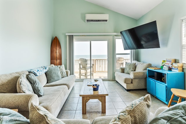 2310 New River Inlet Rd Unit 1, North Topsail Beach, NC 28460 - living area featuring a wall mounted AC, vaulted ceiling, light tile patterned flooring, and plenty of natural light