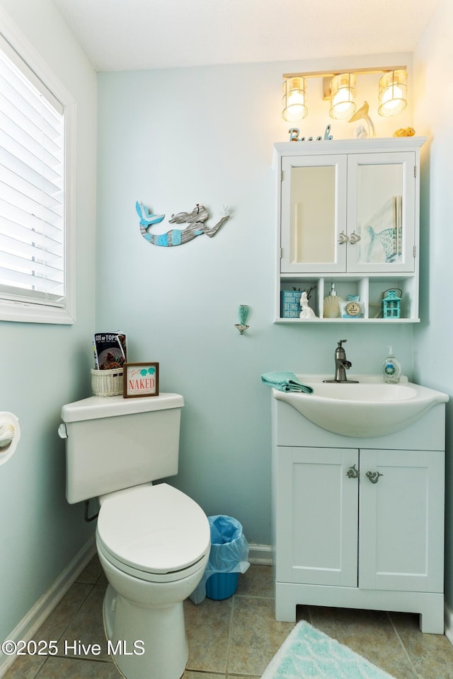 2310 New River Inlet Rd Unit 1, North Topsail Beach, NC 28460 - half bathroom featuring vanity and tile patterned floors