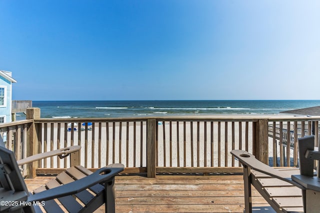 2310 New River Inlet Rd Unit 1, North Topsail Beach, NC 28460 - deck featuring view of water and beach