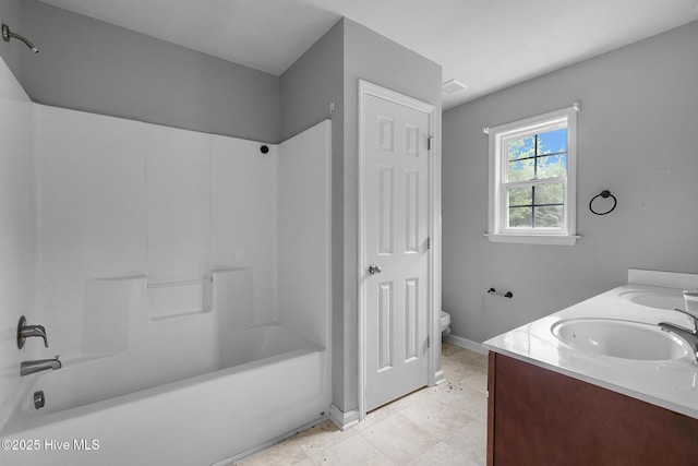 308 Big Tree Ln, Chinquapin, NC 28521 - bathroom with tub / shower combination, double vanity, and tile patterned flooring