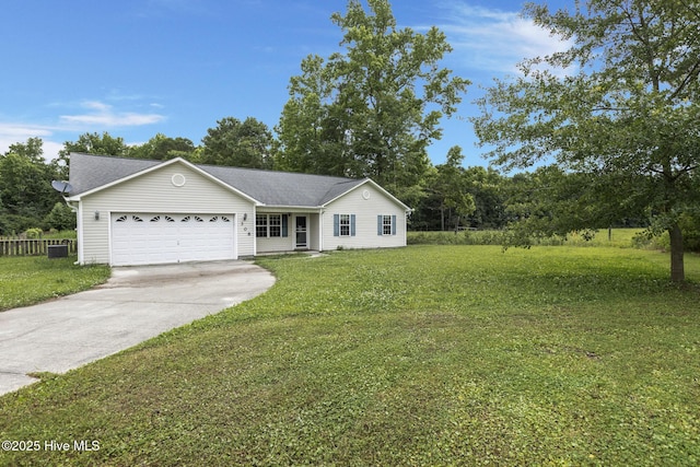 308 Big Tree Ln, Chinquapin, NC 28521 - single story home with an attached garage, driveway, and a front lawn