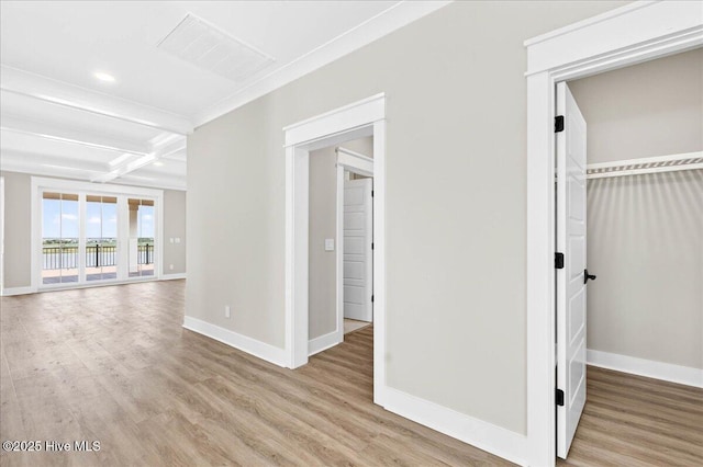 1711 Hemingway Dr SW, Ocean Isle Beach, NC 28469 - hallway with light wood-style flooring, beam ceiling, coffered ceiling, baseboards, and recessed lighting