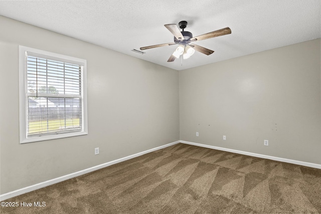 302 Josie Ct, Hubert, NC 28539 - carpeted spare room with plenty of natural light, a ceiling fan, and a textured ceiling