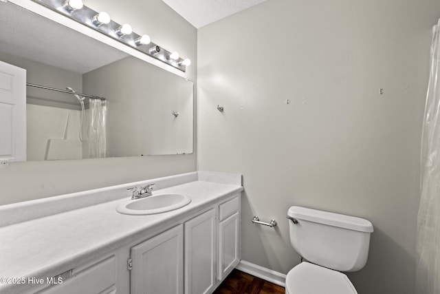 302 Josie Ct, Hubert, NC 28539 - bathroom featuring vanity, wood finished floors, a shower with shower curtain, and a textured ceiling