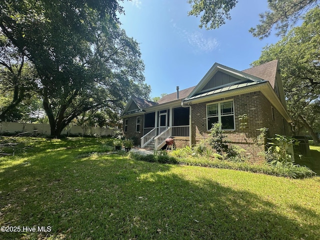 2790 Scotts Hill Loop Rd, Wilmington, NC 28411 - rear view of property featuring brick siding