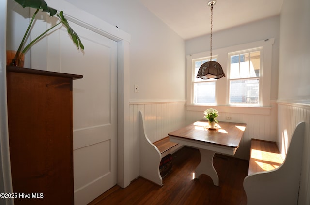 1409 E Walnut St, Goldsboro, NC 27530 - dining area featuring a wainscoted wall and wood finished floors