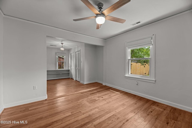 822 Chattawka Ln, New Bern, NC 28560 - spare room with a ceiling fan, baseboards, light wood-type flooring, and ornamental molding