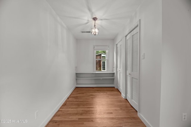 822 Chattawka Ln, New Bern, NC 28560 - corridor featuring light wood-style flooring and baseboards