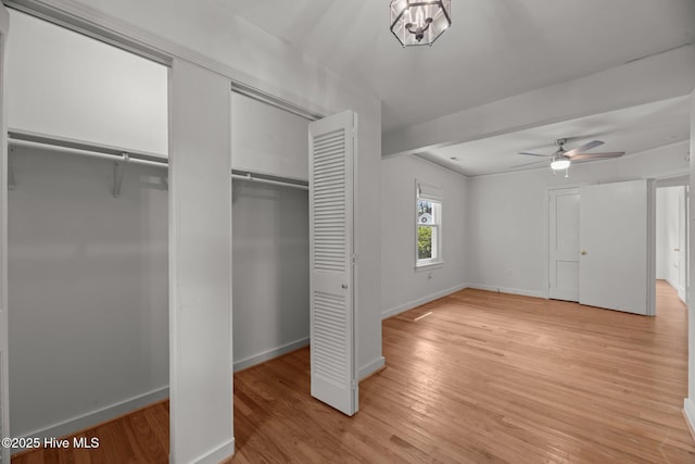 822 Chattawka Ln, New Bern, NC 28560 - unfurnished bedroom featuring two closets, baseboards, and light wood-type flooring