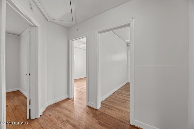 822 Chattawka Ln, New Bern, NC 28560 - hallway featuring attic access, wood finished floors, and baseboards