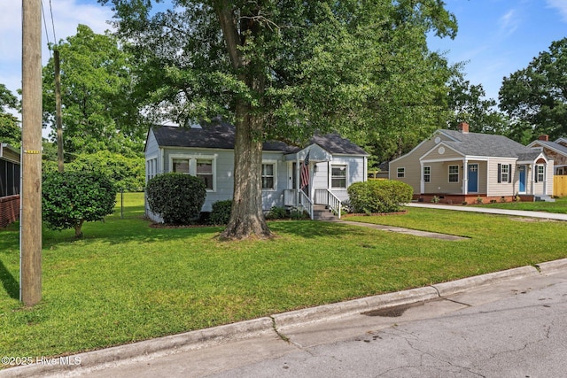 822 Chattawka Ln, New Bern, NC 28560 - view of front of property featuring a chimney, a front yard, and crawl space