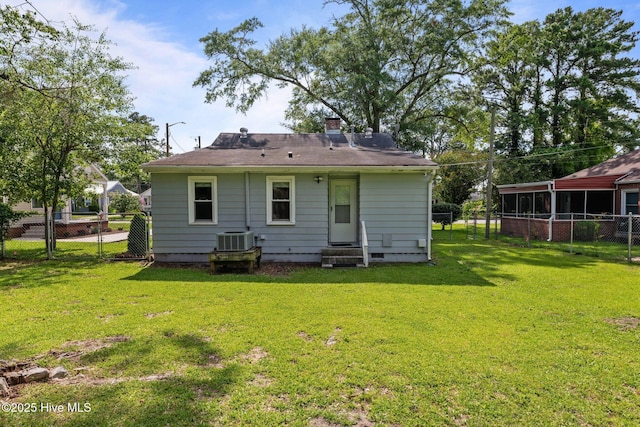 822 Chattawka Ln, New Bern, NC 28560 - back of property featuring entry steps, central AC, and a chimney