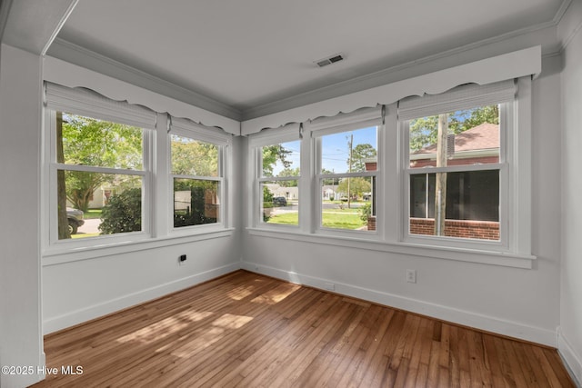 822 Chattawka Ln, New Bern, NC 28560 - unfurnished sunroom with baseboards, hardwood / wood-style floors, and crown molding