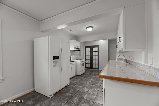 822 Chattawka Ln, New Bern, NC 28560 - kitchen featuring white appliances, a sink, french doors, and white cabinets