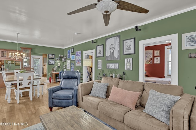 2008 Market St, Wilmington, NC 28403 - living area with light wood-type flooring, a chandelier, ceiling fan, and ornamental molding