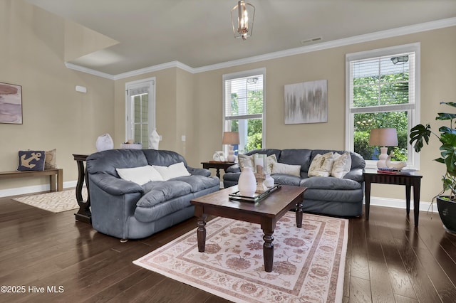 133 Overlook Dr, Wilmington, NC 28411 - living area featuring dark wood finished floors and ornamental molding