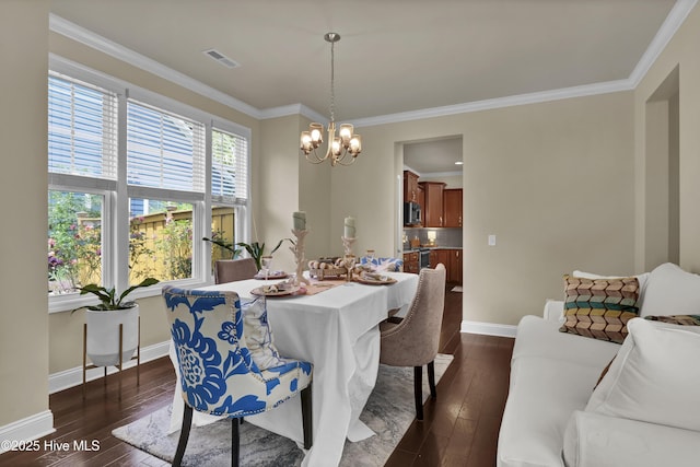 133 Overlook Dr, Wilmington, NC 28411 - dining room featuring a chandelier, dark wood-style floors, and crown molding