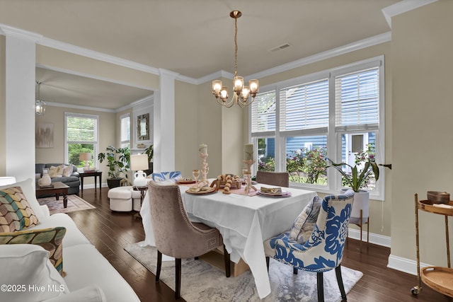 133 Overlook Dr, Wilmington, NC 28411 - dining room featuring dark wood finished floors, a chandelier, and ornamental molding