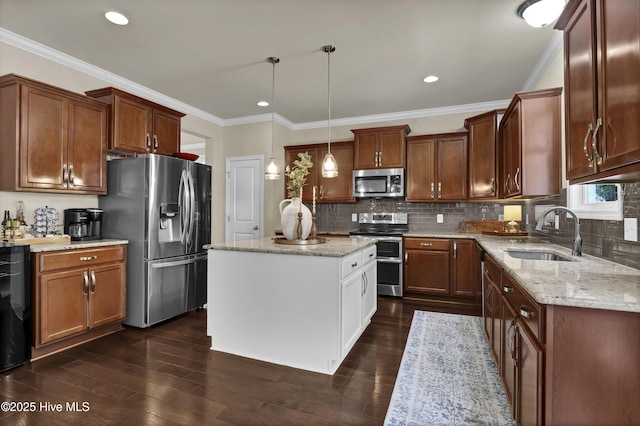 133 Overlook Dr, Wilmington, NC 28411 - kitchen with appliances with stainless steel finishes, dark wood-style flooring, light stone counters, tasteful backsplash, and crown molding