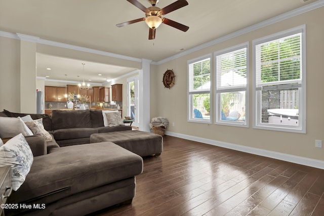 133 Overlook Dr, Wilmington, NC 28411 - living area featuring dark wood-style floors, a chandelier, a ceiling fan, and crown molding