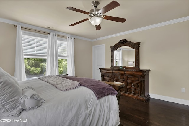 133 Overlook Dr, Wilmington, NC 28411 - bedroom with dark wood-style flooring, ornamental molding, and a ceiling fan