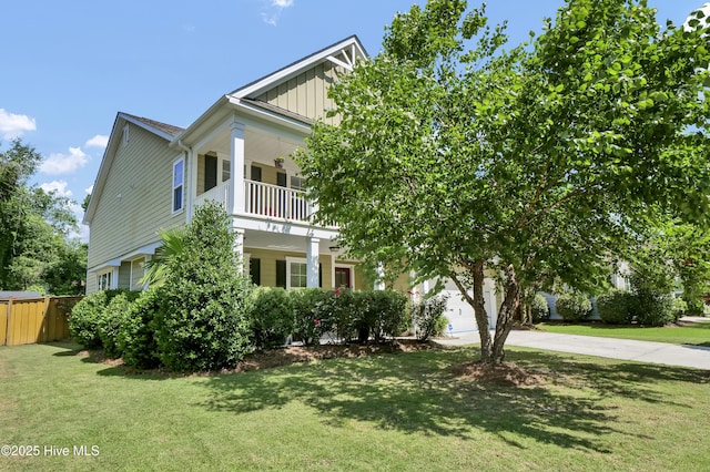 133 Overlook Dr, Wilmington, NC 28411 - view of side of property with driveway, a garage, board and batten siding, and a balcony