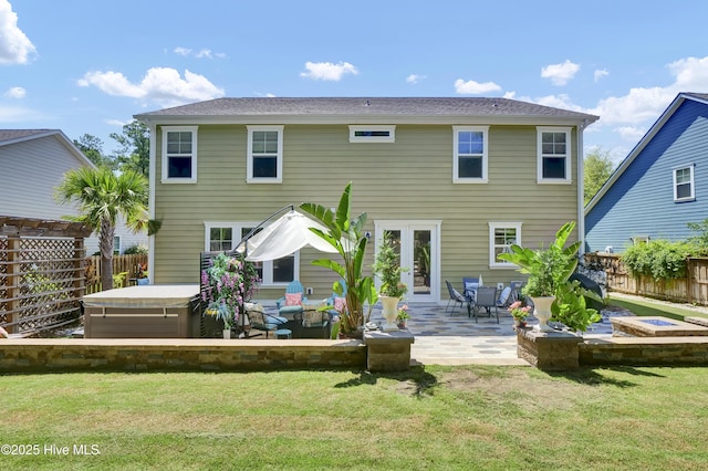 133 Overlook Dr, Wilmington, NC 28411 - rear view of property featuring a hot tub and a patio