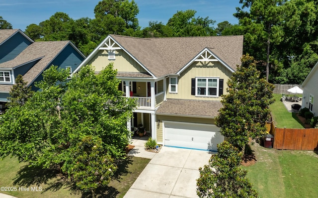 133 Overlook Dr, Wilmington, NC 28411 - view of front of property featuring board and batten siding, an attached garage, driveway, and a shingled roof