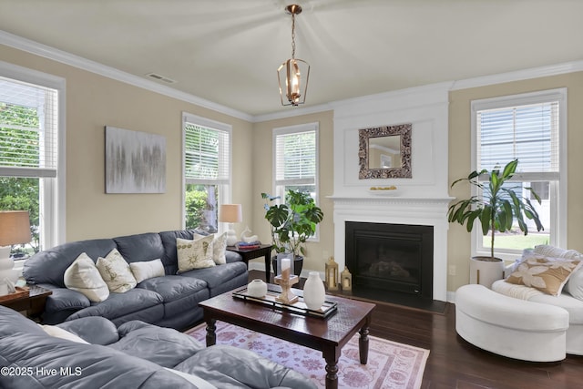 133 Overlook Dr, Wilmington, NC 28411 - living area with dark wood-type flooring, crown molding, and a fireplace