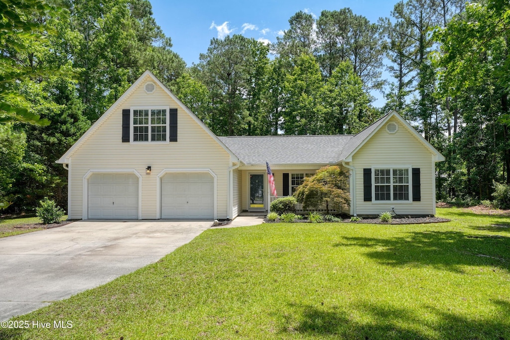 7407 Creek Stone Ct, Leland, NC 28451 - view of front of property featuring concrete driveway, a front yard, and a shingled roof