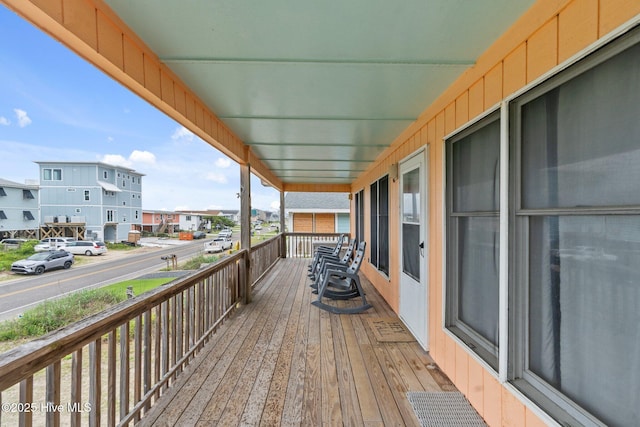 210 W Beach Dr, Oak Island, NC 28465 - deck with a residential view