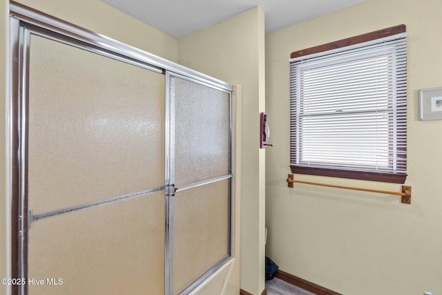 210 W Beach Dr, Oak Island, NC 28465 - full bathroom with toilet and bath / shower combo with glass door