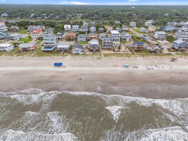 210 W Beach Dr, Oak Island, NC 28465 - aerial perspective of suburban area with unending shoreline