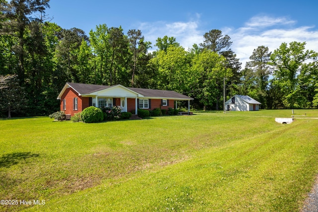 4173 Middle Rd, Trenton, NC 28585 - view of front of property with a front lawn