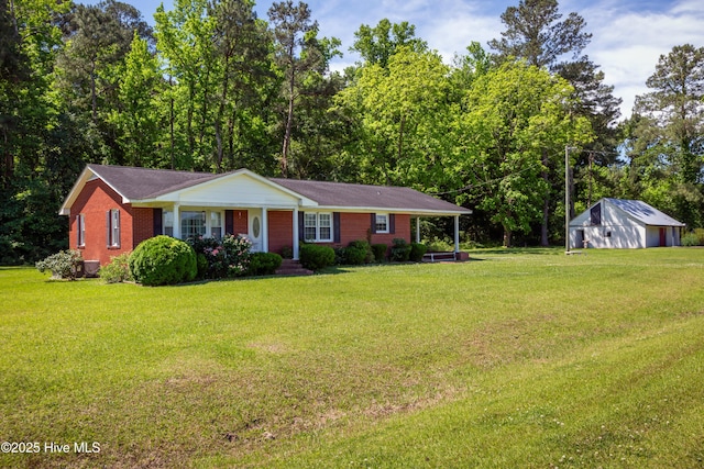 4173 Middle Rd, Trenton, NC 28585 - view of front facade featuring a front lawn and brick siding