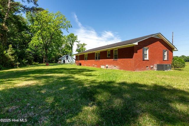 4173 Middle Rd, Trenton, NC 28585 - view of property exterior with a yard, brick siding, and crawl space