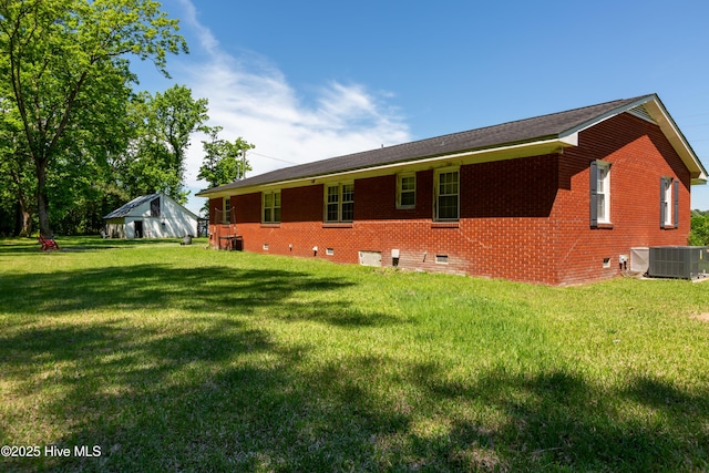 4173 Middle Rd, Trenton, NC 28585 - back of property with crawl space, a yard, and brick siding
