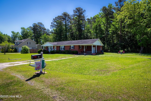 4173 Middle Rd, Trenton, NC 28585 - ranch-style house featuring driveway and a front lawn