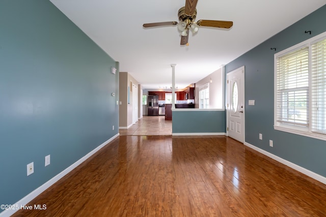 4173 Middle Rd, Trenton, NC 28585 - unfurnished living room featuring a ceiling fan and dark wood-type flooring