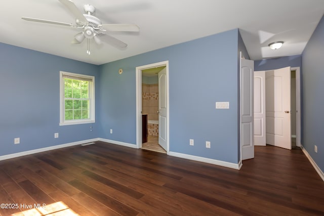 4173 Middle Rd, Trenton, NC 28585 - unfurnished bedroom featuring dark wood-type flooring and ensuite bath