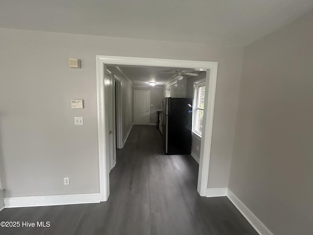1310 Washington St E, Wilson, NC 27893 - hallway featuring dark wood-type flooring and baseboards